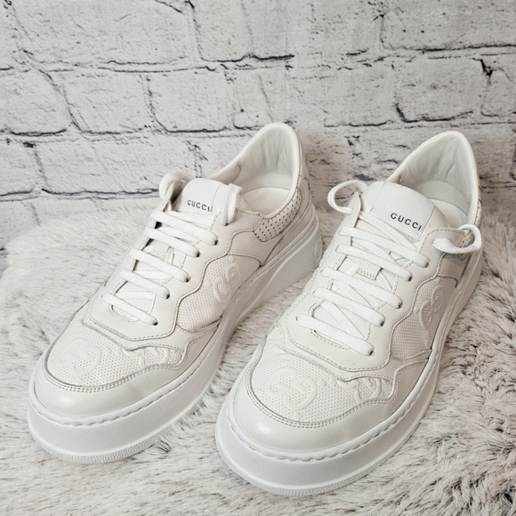Gucci Shoes - Gucci womens embossed GG white leather sneakers size 9